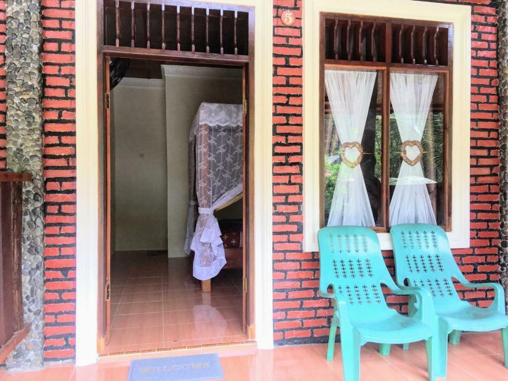 Sahnan Guest House Bukit Lawang Kültér fotó